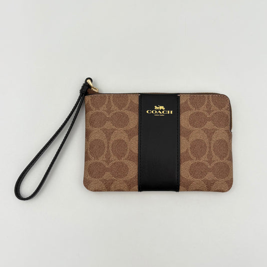 Coach Corner Zip Wristlet In Signature Canva