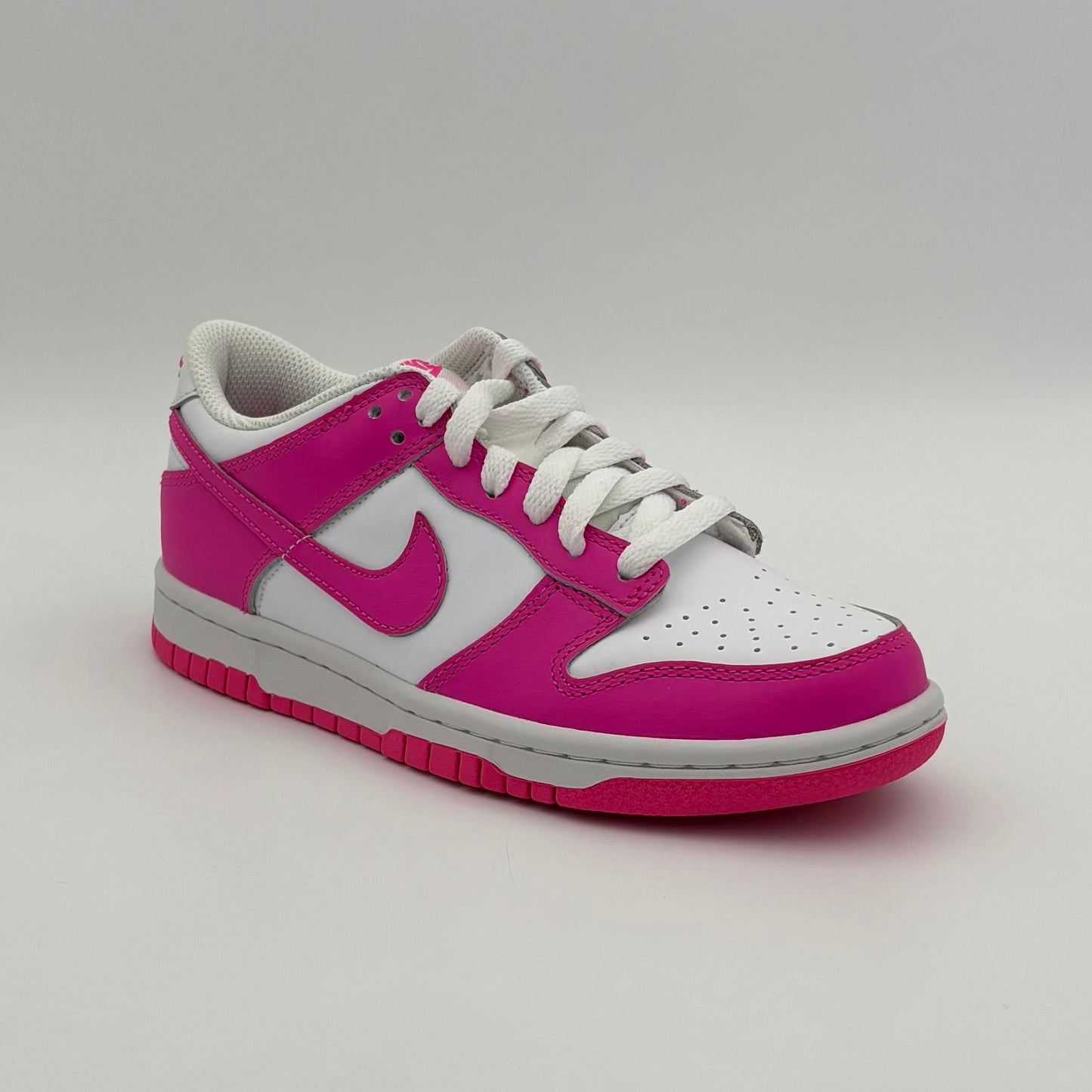 Nike Dunk Low en fucsia láser